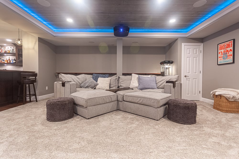 Basement theatre room with shiplap ceiling design in Cincinnati, OH by Legacy Builders