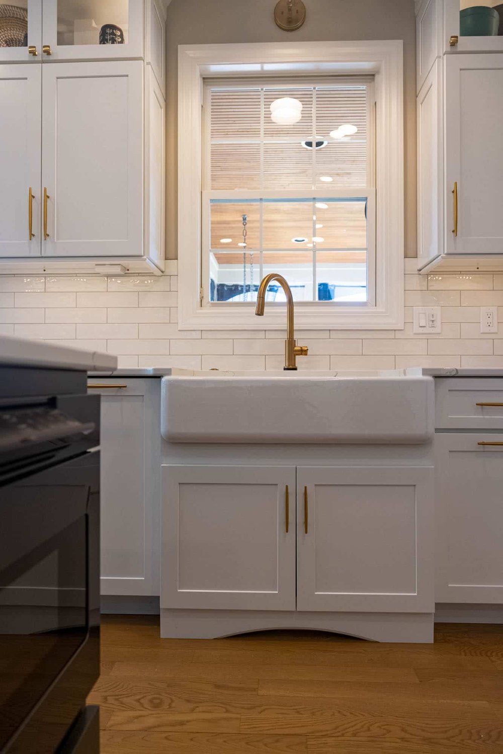 Cabinet storage beneath sink in Liberty Township, OH kitchen remodel by Legacy Builders