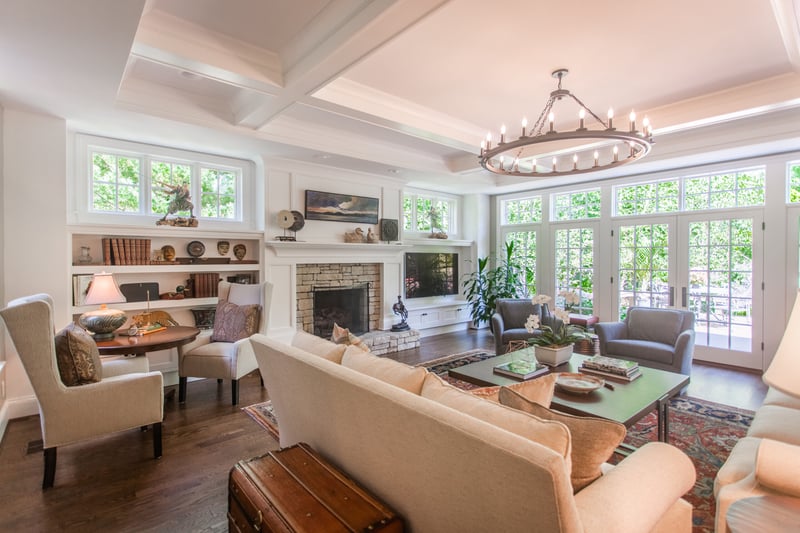 Home addition in Cincinnati, OH with stacked stone fireplace by Legacy Builders