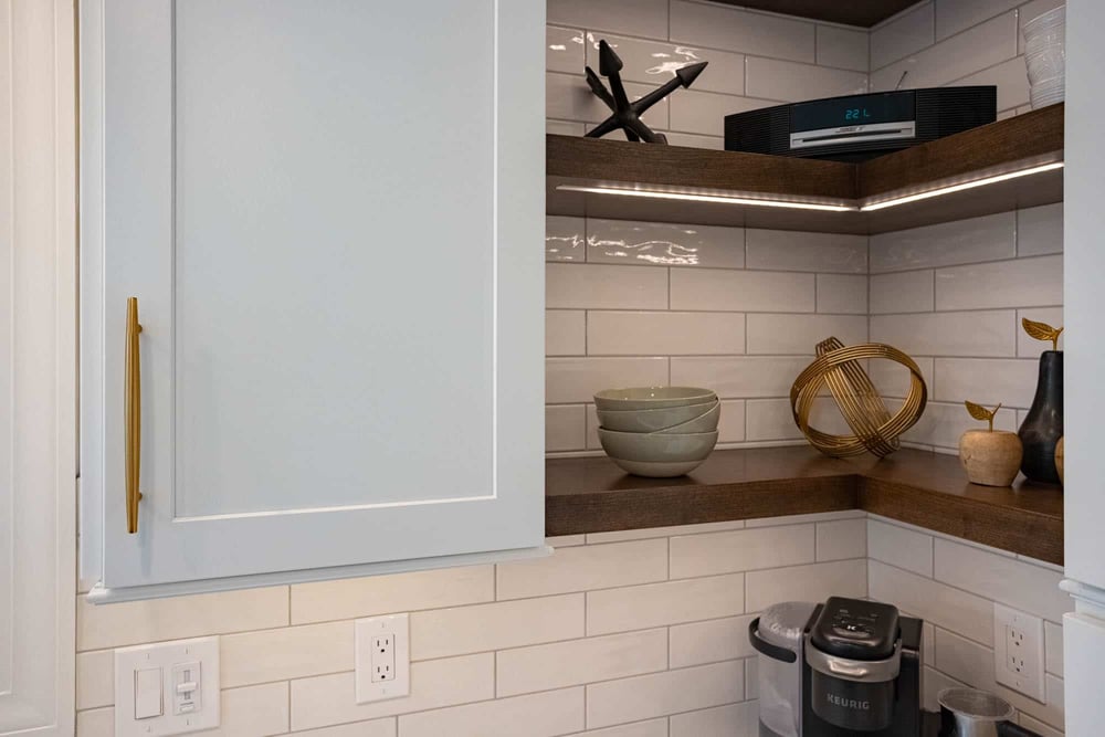 Open shelving next to shaker cabinet in Liberty Township, Ohio kitchen remodel