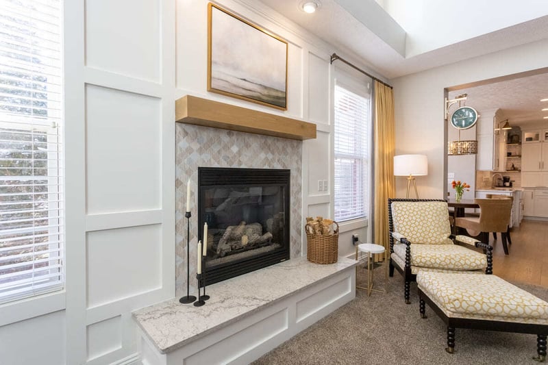 Fireplace in Cincinnati, OH home remodel with mosaic tile surround by Legacy Builders