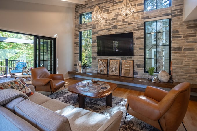 Great room addition with sliding doors open to outdoor living space in Cincinnati by Legacy Builders