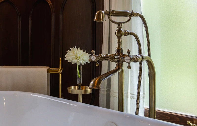 Faucet fixture above tub in Cincinnati historic home remodel by Legacy Builders