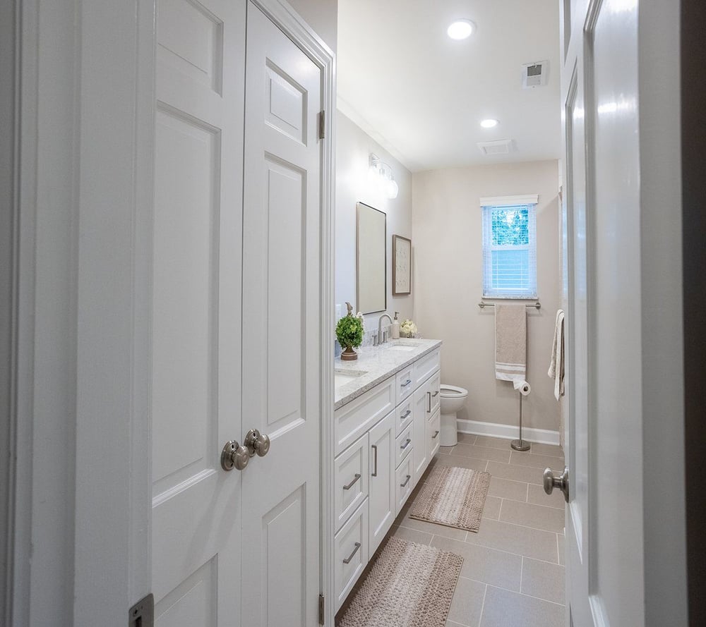 Hall bathroom in main floor remodel in White Oak, OH with water closet layout