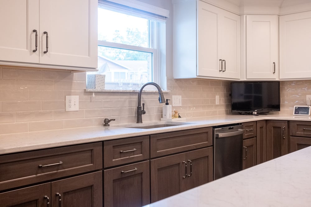 Under mount sink in two tone kitchen remodel White Oak, OH by Legacy Builders